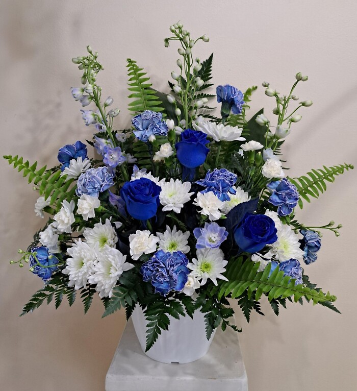 Floral Tribute Arrangement with Blue Roses